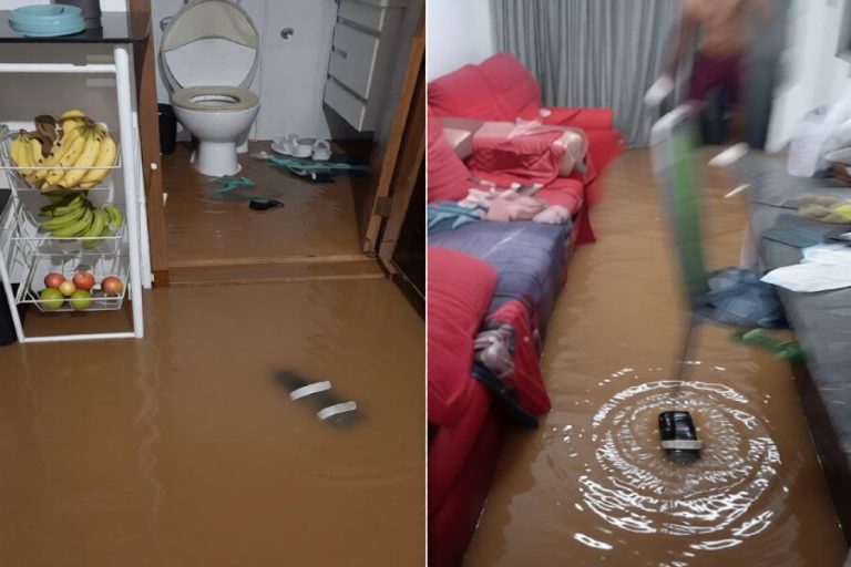 Mulher chora ao ver casa ser destruída por enxurrada em Anagé